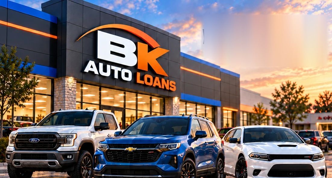 BK Auto Loans dealership at sunset with a white truck, blue SUV and white sedan out front